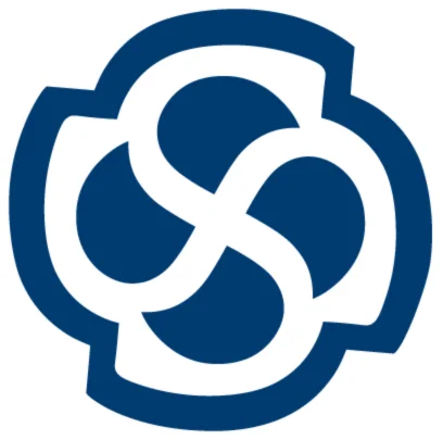 Professional architect working on complex system diagrams on large monitor displaying UML models and architectural frameworks in modern office environment